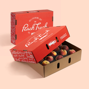 Two boxes of peaches from The Peach Truck, one has been opened